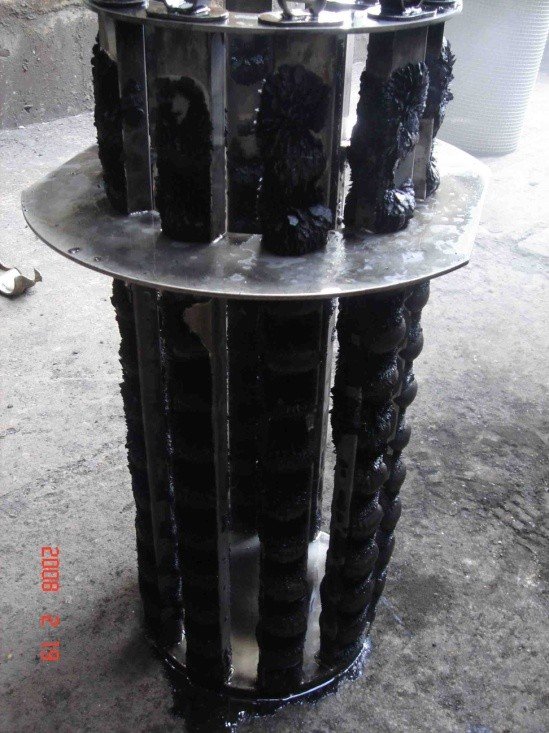 ADS magnetic core after operation, coated with captured iron fines